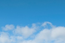 Clouds against a blue sky