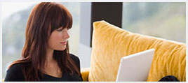 A woman working on her laptop