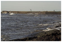 Rough seas against a beach